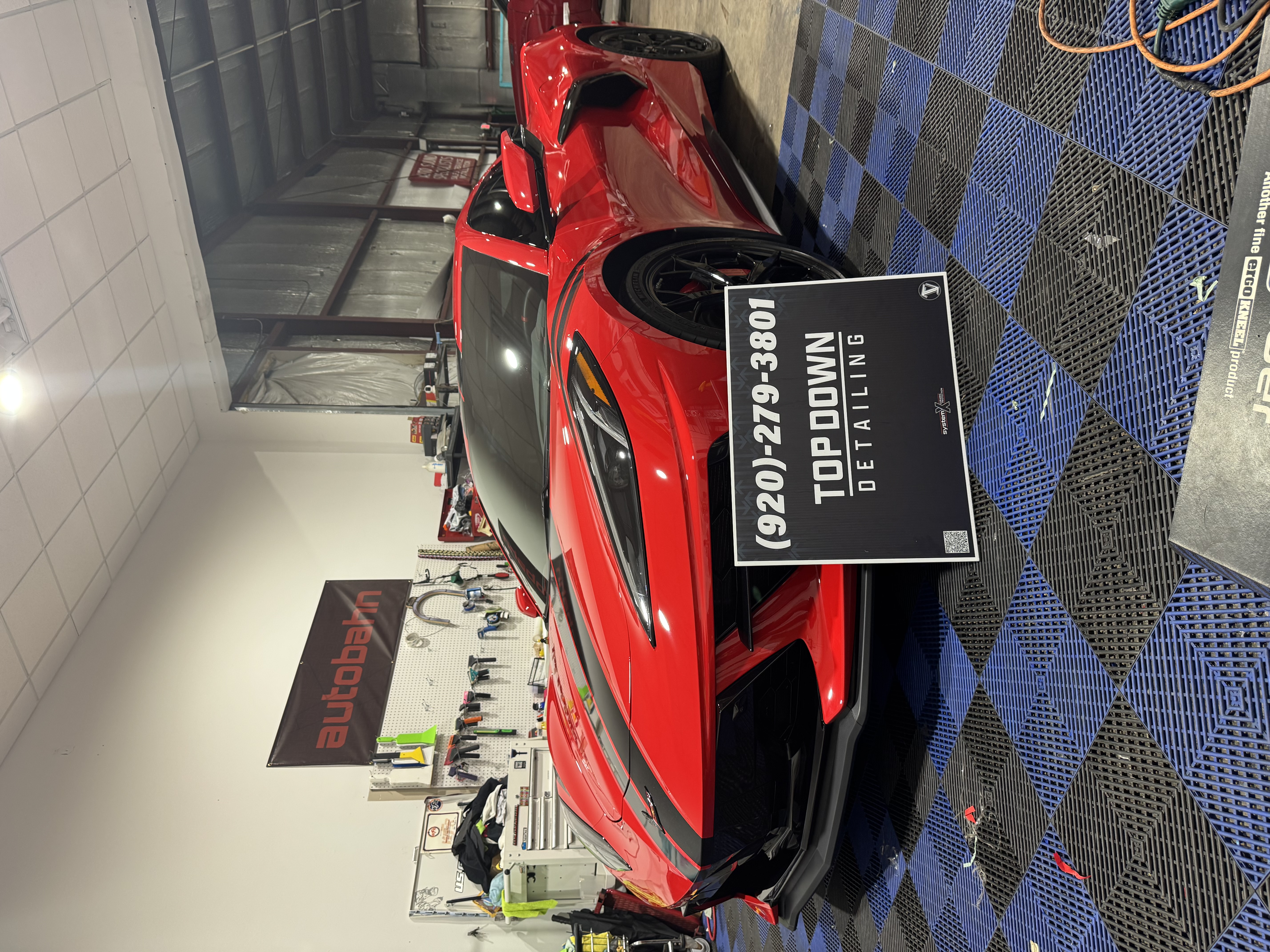 Top Down Detailing shop with vehicle being detailed